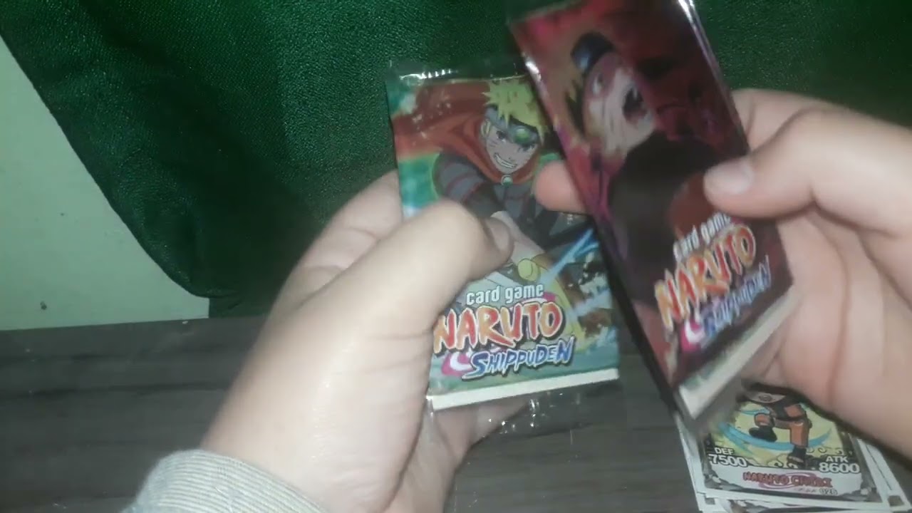 abrindo 7 pacotes de cards de (naruto)