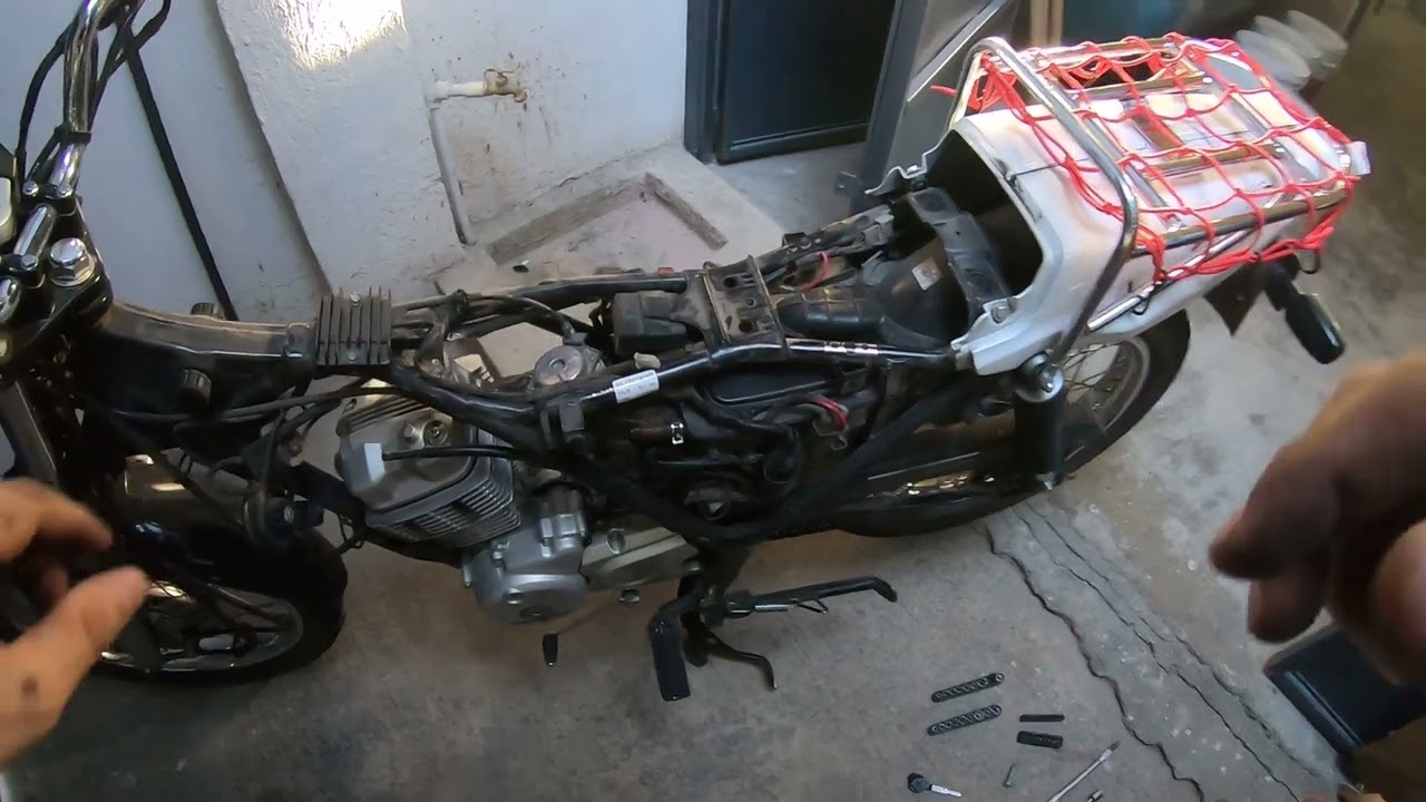 filtro de aire honda cargo 150  donde esta como se cambia