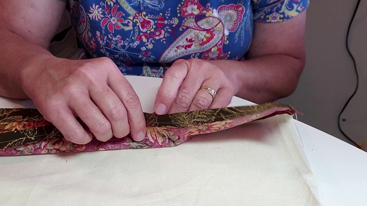 Attaching a decorative border to towels