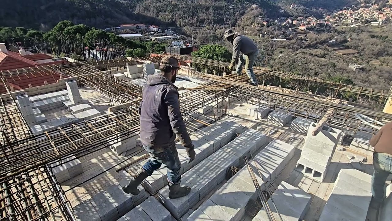 Concrete Slab Beam Installation in Progress | تنفيذ كمرات بلاطة خرسانية في الموقع