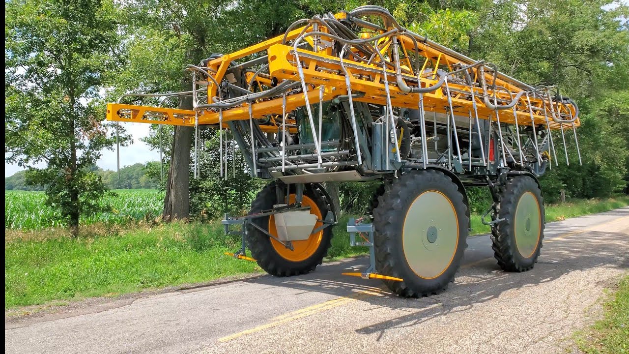 Hagie STS12 sprayer with 120' boom and Montag delivery system side dressing corn in Michigan