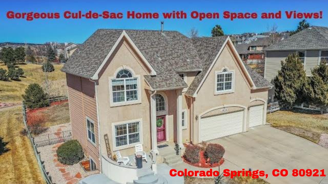 Gorgeous Cul-de-Sac Home on a large lot with Open Space and Amazing Front Range views!