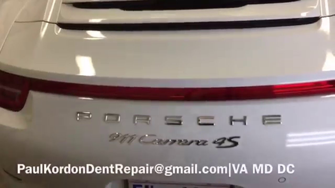 Huge dent in a brand new Porsche | Paul Kordon Dent Repair Northern Virginia