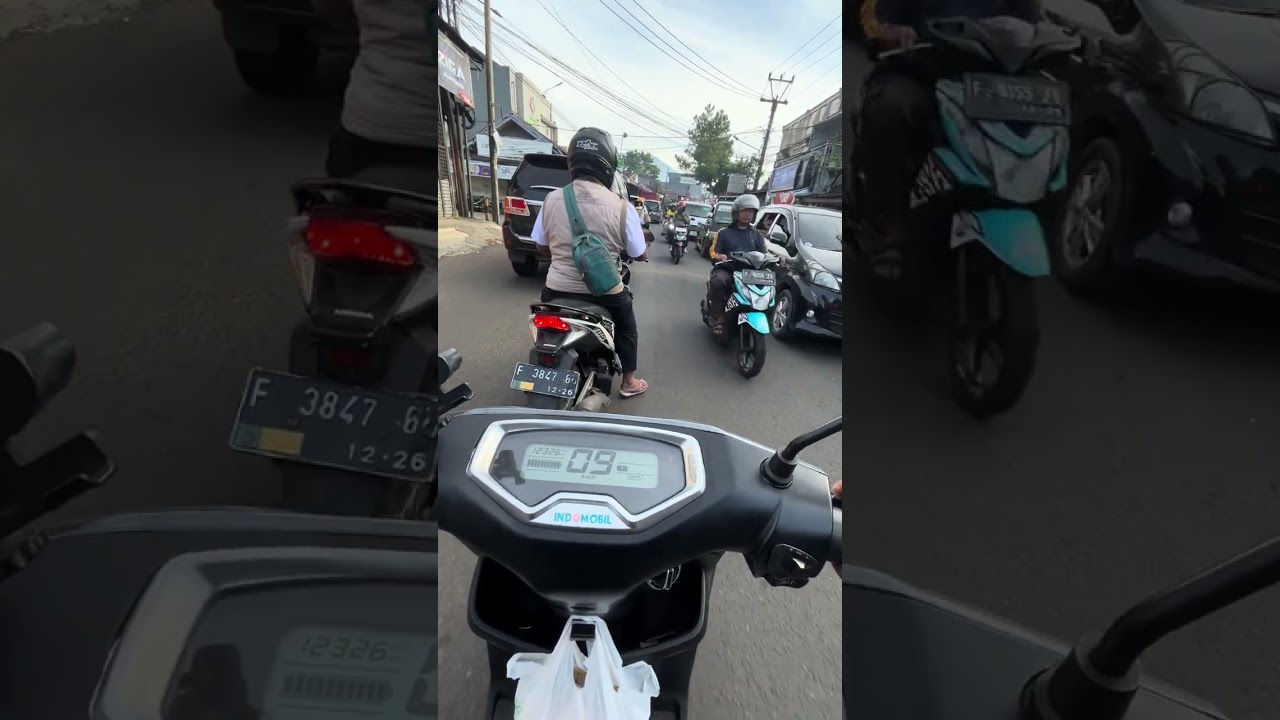 Perjalanan kekantor dengan motor listrik Yadea T9 pemandangan areal kota sukabumi