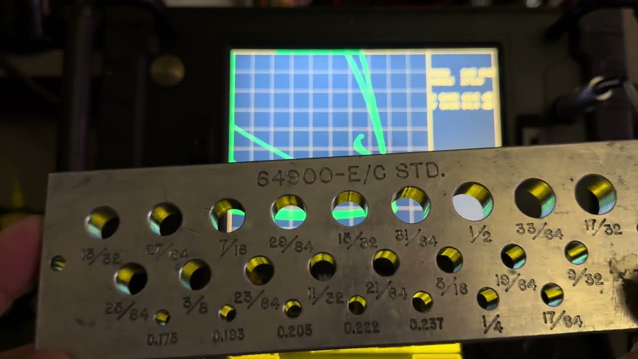Eddy current testing on aircraft fastener holes using manual probe vs rotating scanner.