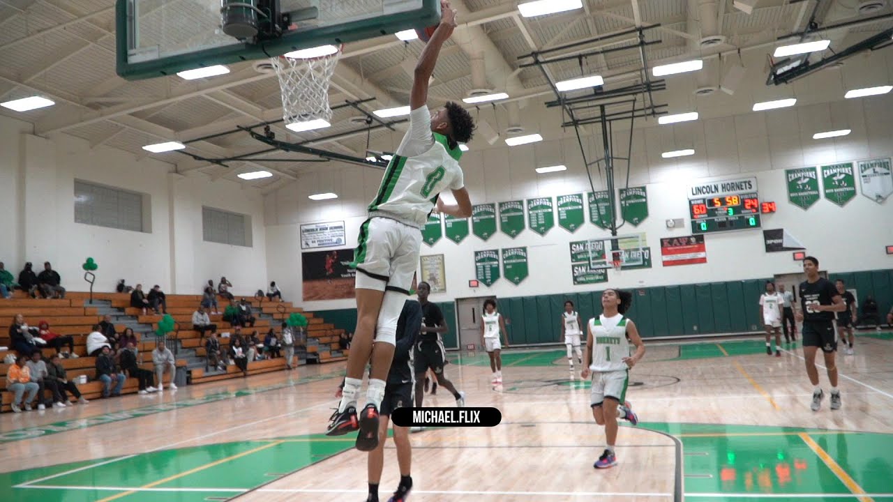 Norman Powell watches and Coach Jeff is mic'd up as Lincoln High host the Army/Navy Academy