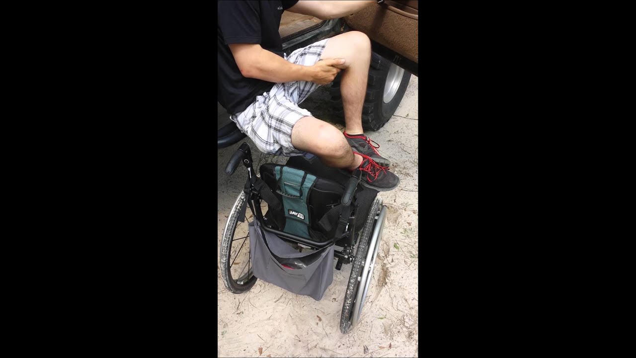 Paraplegic transfer into lifted truck