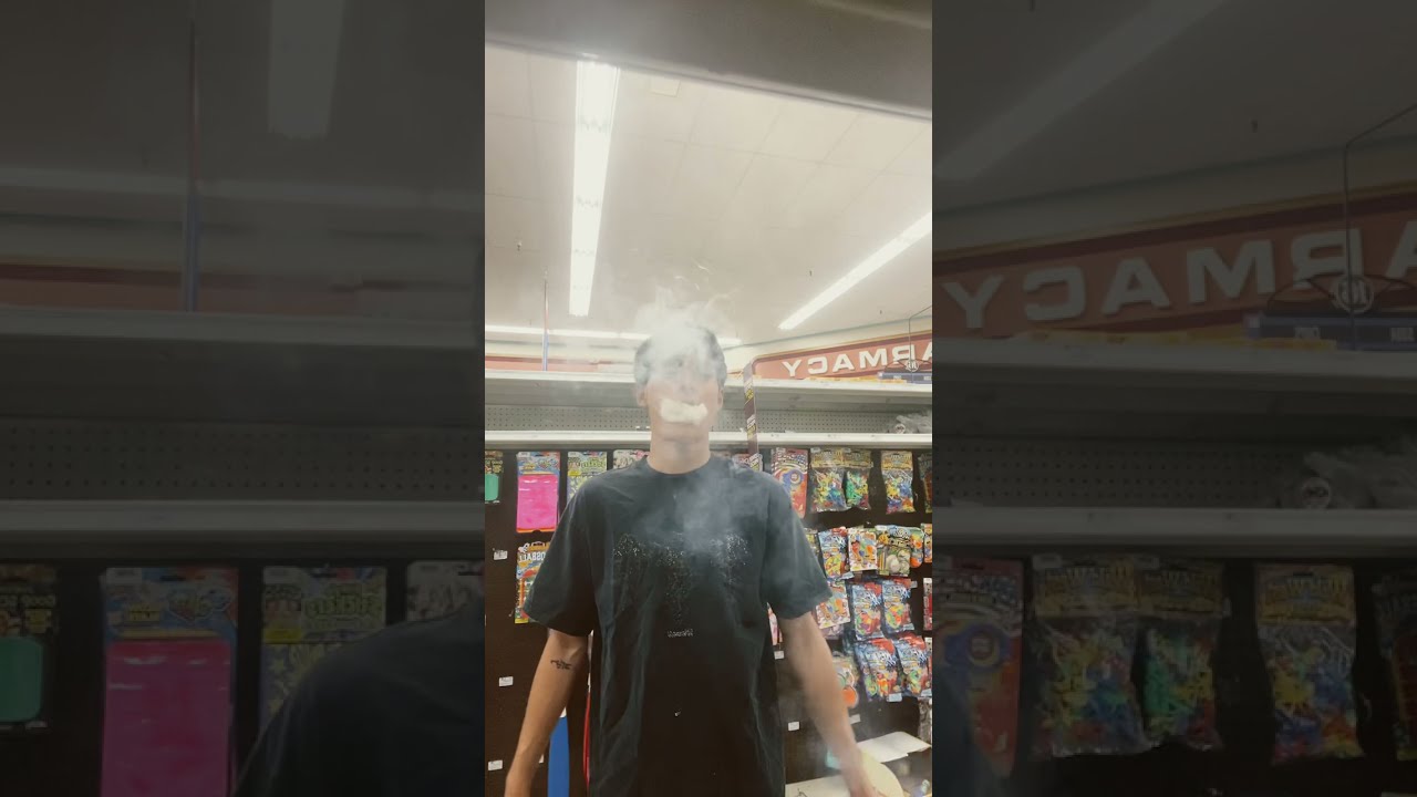 smoking a backwood at the grocery store