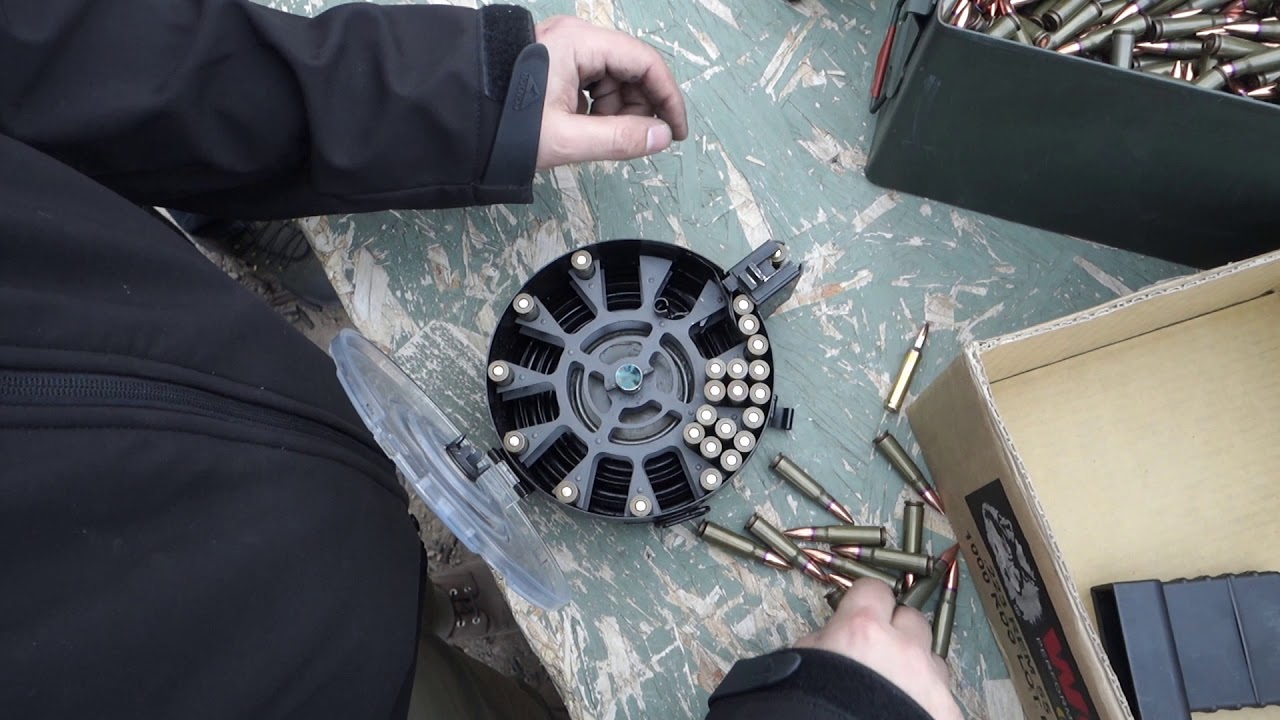 Reloading a KCI AK 75 round drum mag