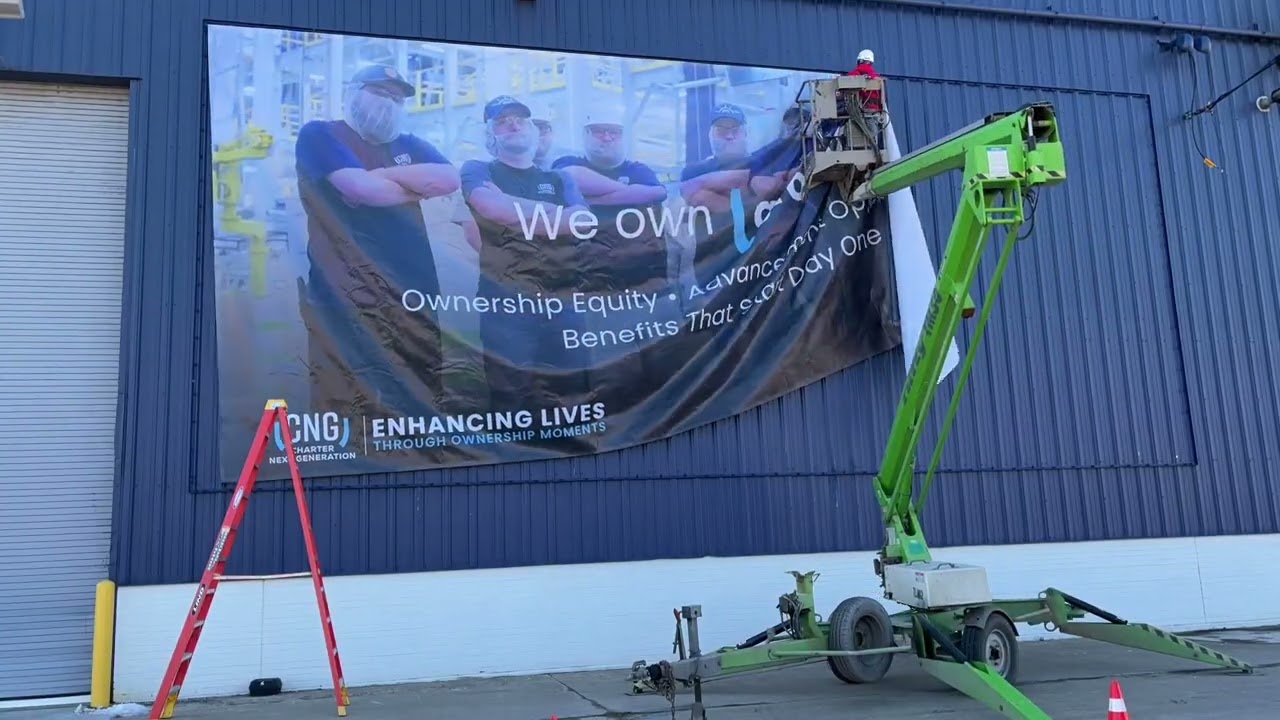 Lind SignSpring Installation on Metal Siding at Charter Next Generation