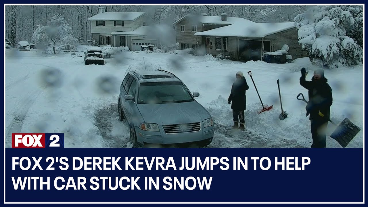 FOX 2's Derek Kevra jumps in to help with car stuck in snow