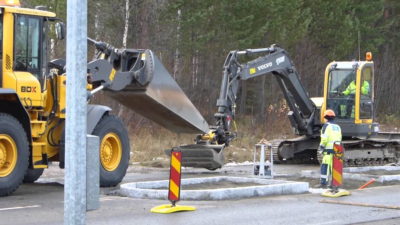 Volvo ECR88 Plus & L70G in work backfilling around a new street refuge