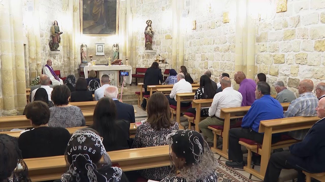 Christians, Muslims gather for special Mass in Jifna for victims of strike on a church