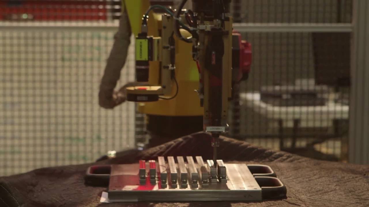 Robotic Screw Feed & Torquing System for Fighter Jet Antenna Assemblies - Compass Automation