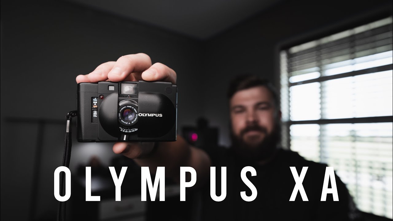 OLYMPUS XA is the BEST point and shoot FILM camera.