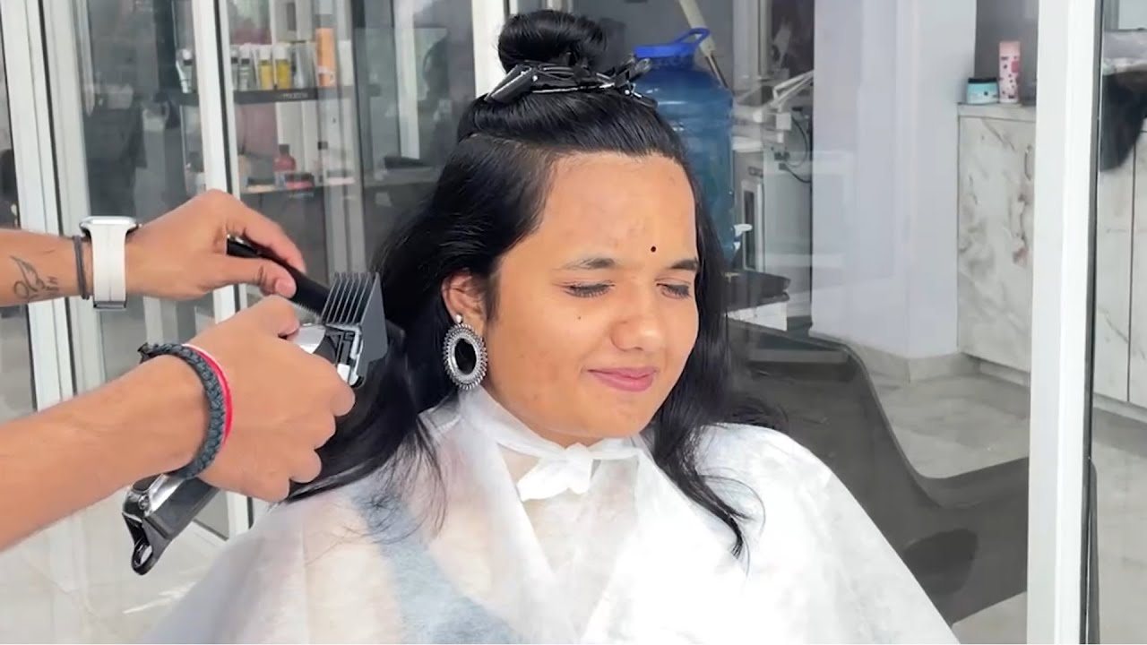 Indian girl grabs her chance at the barbershop