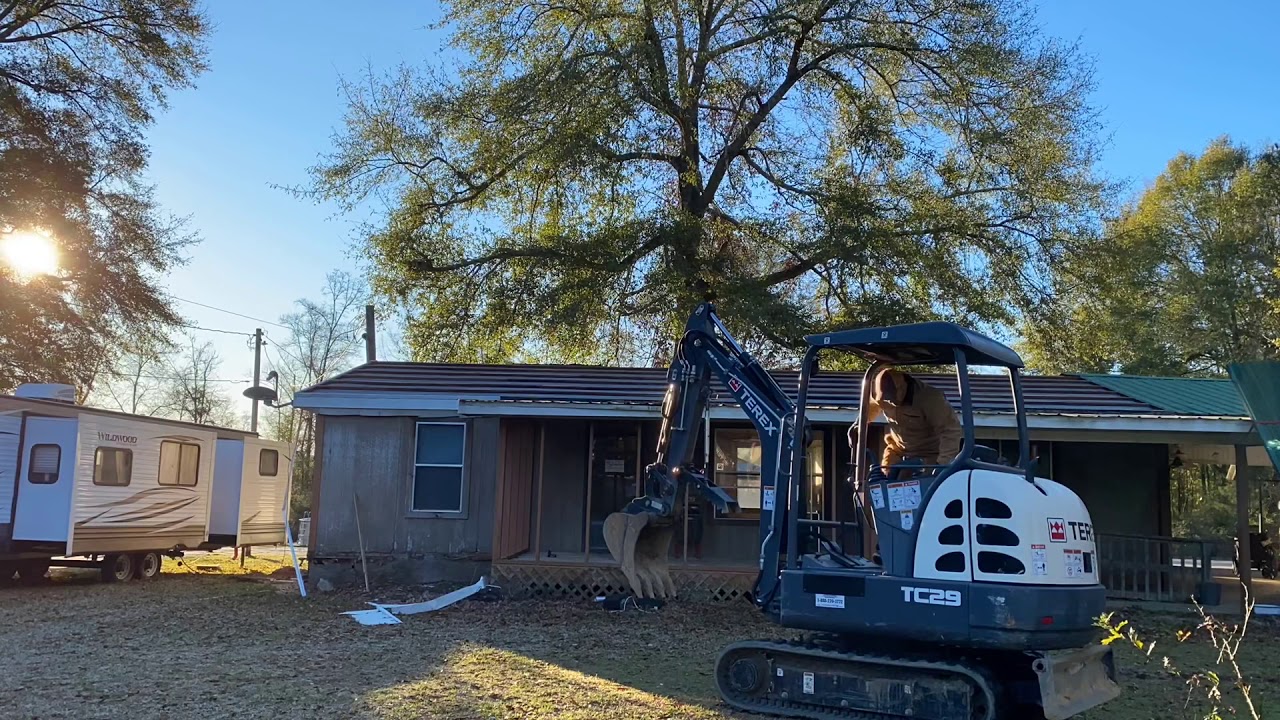 Mini excavator tears down a house!!
