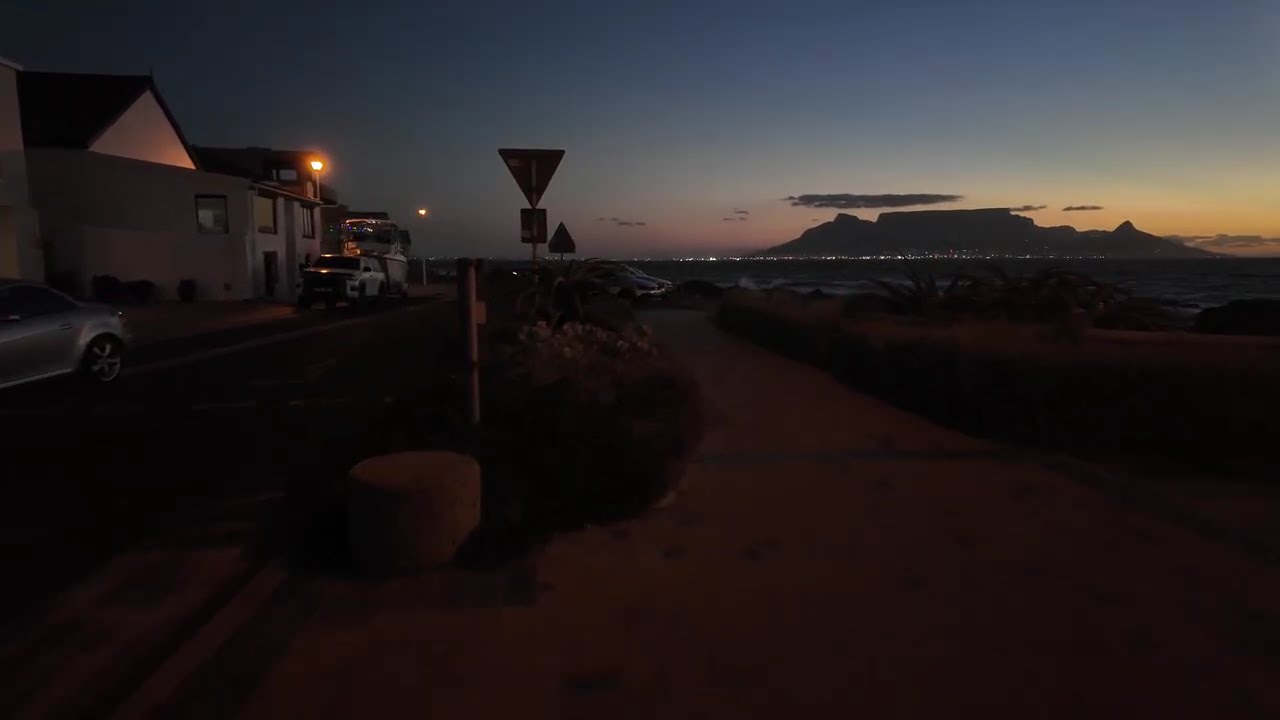 Beach scenery at sunset - calming waves and water - Blouberg Beach, Cape Town Walking Tour