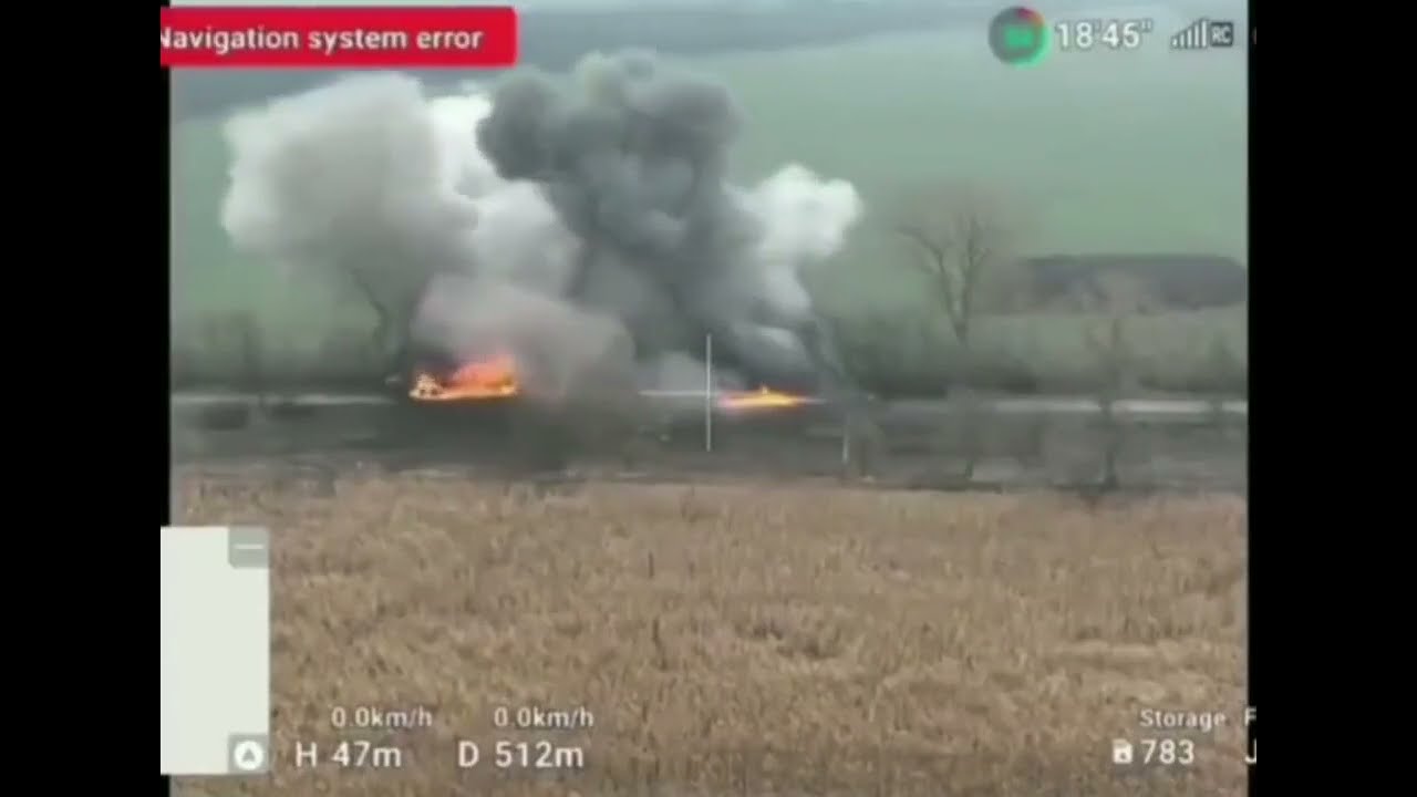 Drone footage of a russian military vehicle (likely a tank truck) getting destroyed on the move.