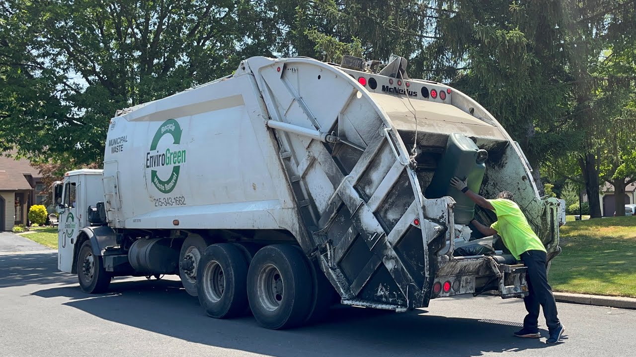 Envirogreen Mack LE McNeilus rear loader garbage truck