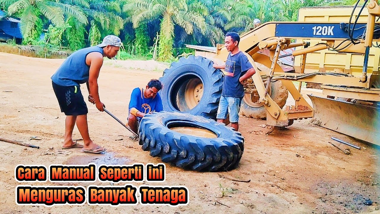 Cara pemasangan Ban tubles Motor Grader Caterpillar 120 K secara manual