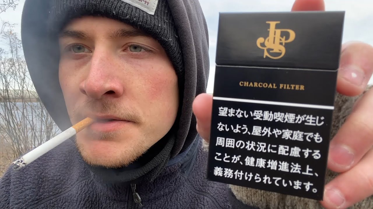 Smoking a John Player Special Black Charcoal Filter Cigarette - Review