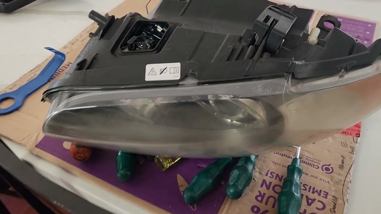 BMW 135i headlight opening procedure