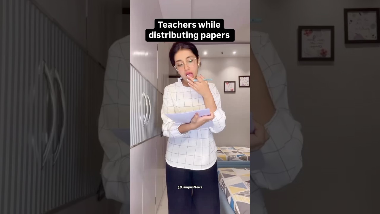 Teaches while distributing papers | 