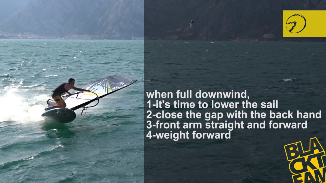 Windsurfing jibe, laydown on big sails.