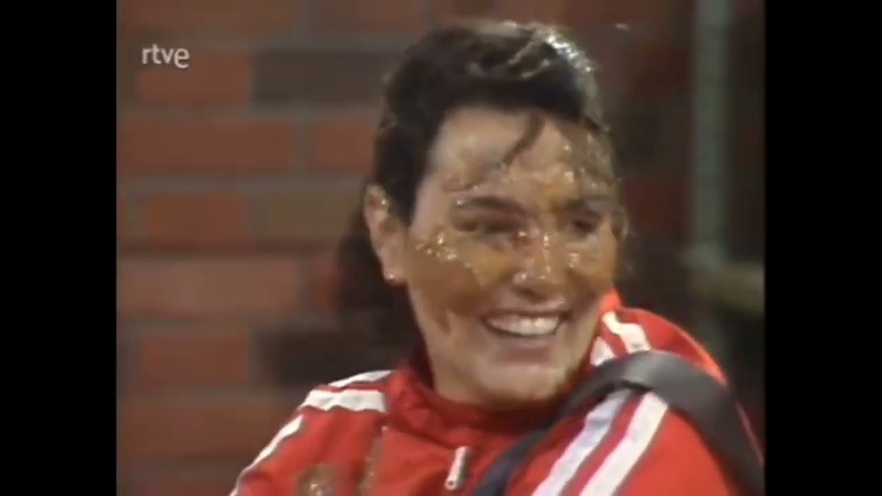 Two female contestants are pied and sprayed in the face on old Spanish show