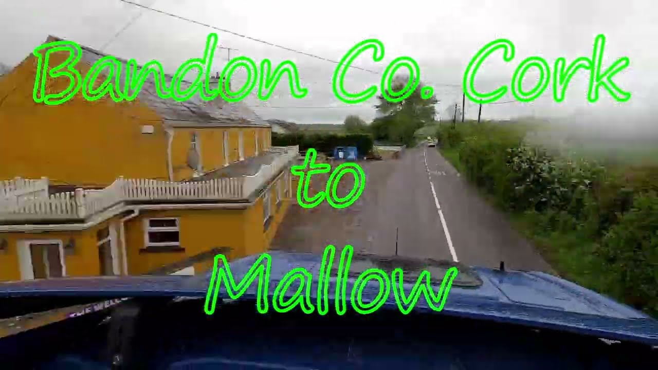 Travel from Bandon Co. Cork through Cork city to Mallow on a rainy day