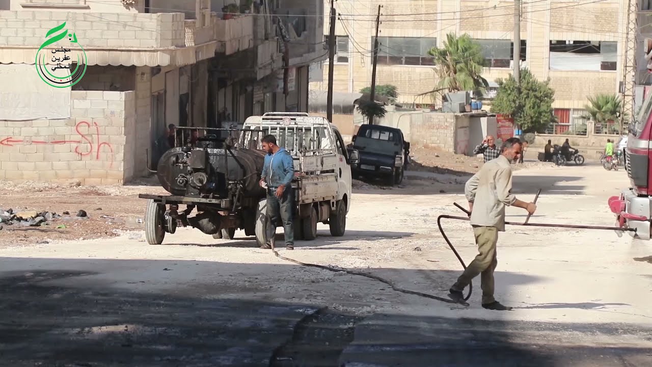 تقرير عن تعبيد شارع السرفيس في حي الأشرفية في مدينة عفرين