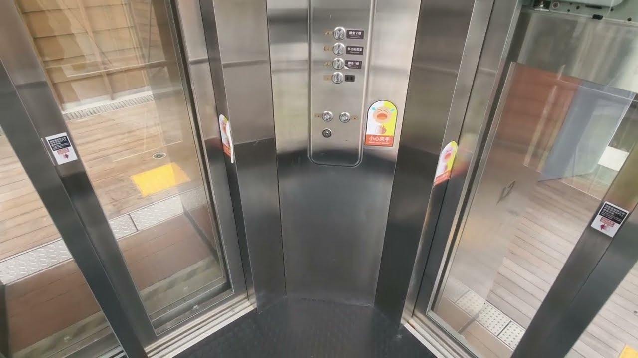 Here's a weird Kone elevator with adjacent door configuration in Taipei, Taiwan