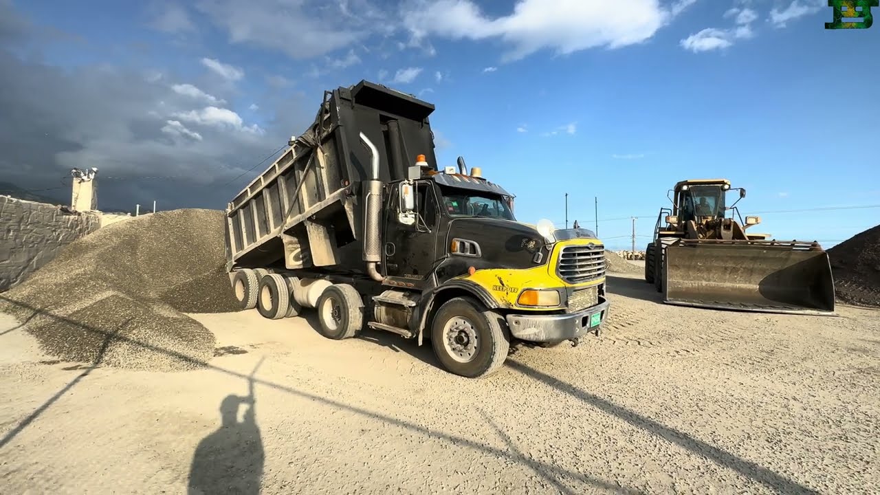 TRUCKS OFFLOADING 7,500 TONS OF SAND & GRAVEL  ONTO THE BARGE S5•E8