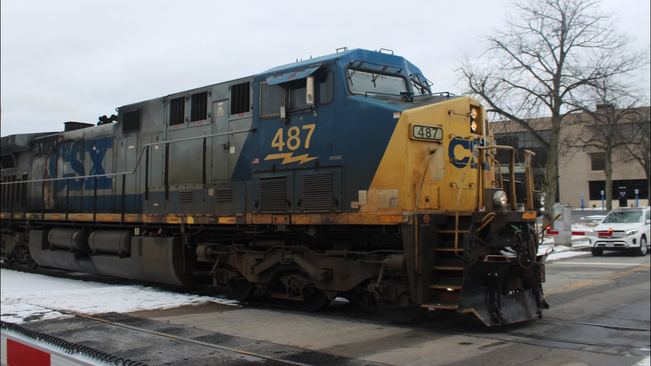 M427 and M426 at Thomas street in Worcester with a CSX Dash-8!!