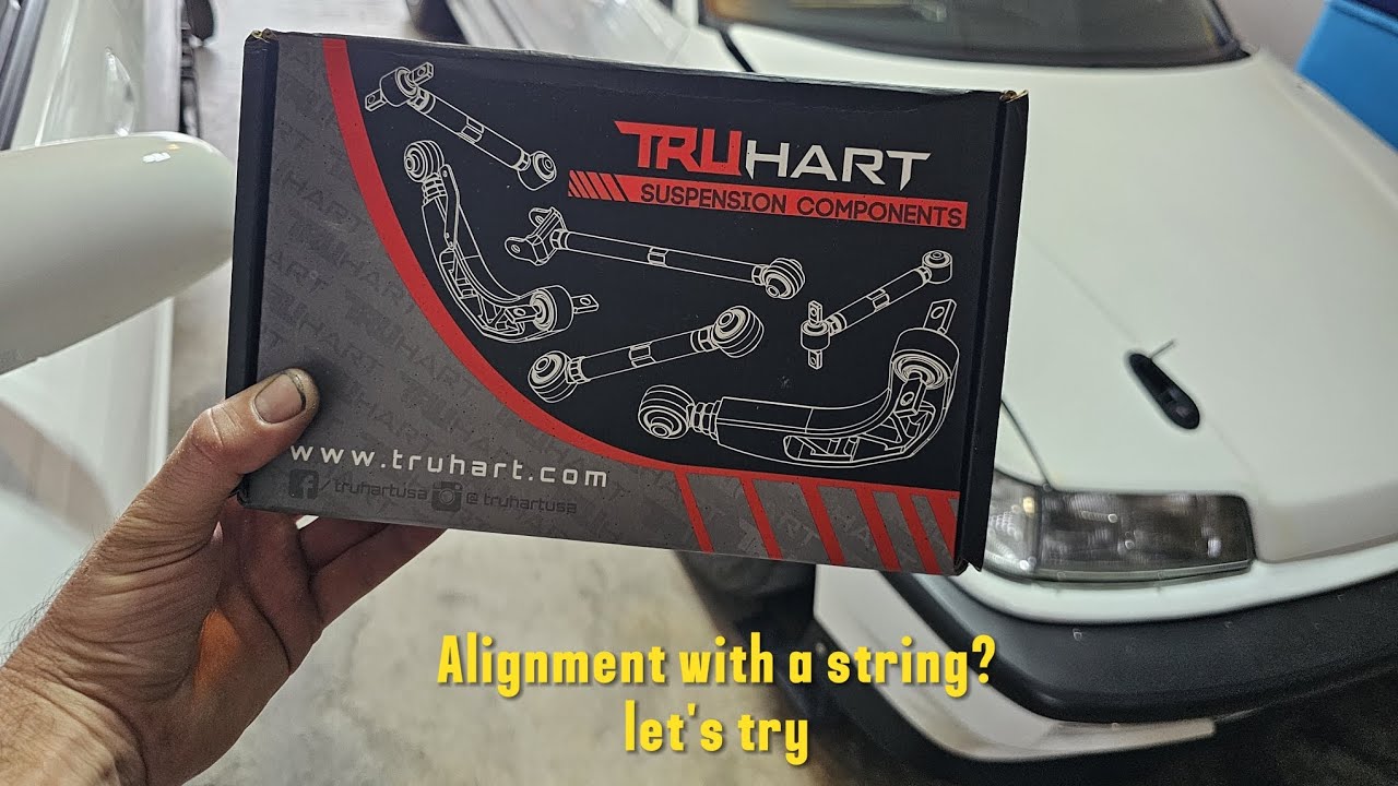 installing Truhart rear toe arms and doing a driveway string alignment on the civic ef