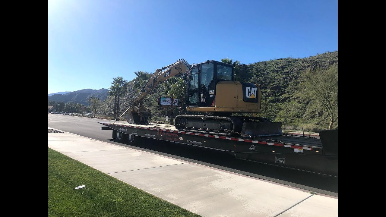 How To Load An Excavator Onto A Low Bed | Pro Shot