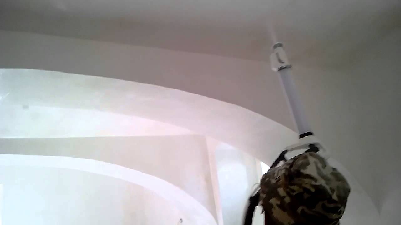 Lime wash painting with a spay gun.