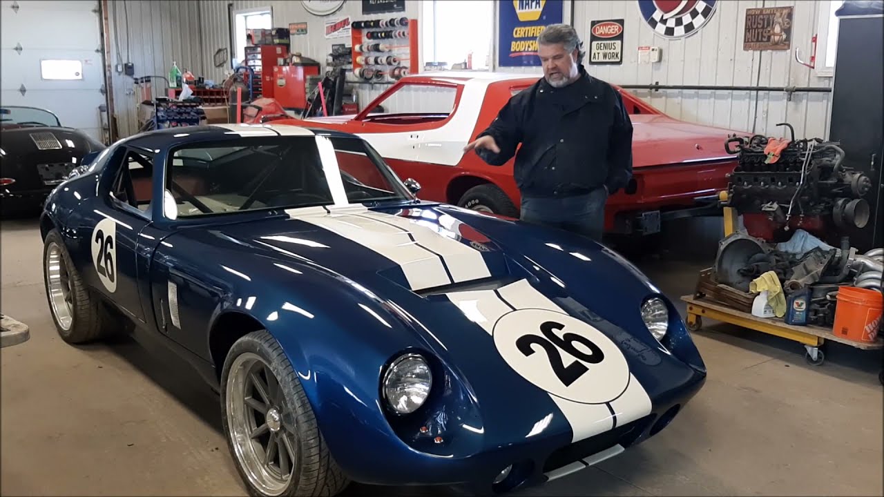 Factory Five 65 Coupe Build Update, Painted Front Nose Installed on Body,  lastchanceautorestore com