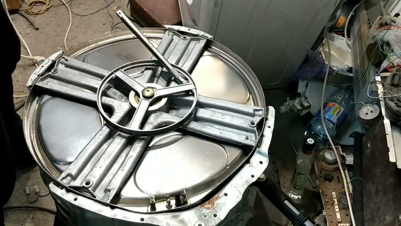 как разобрать стиральную машину Ariston с баком нержавеющей стали.