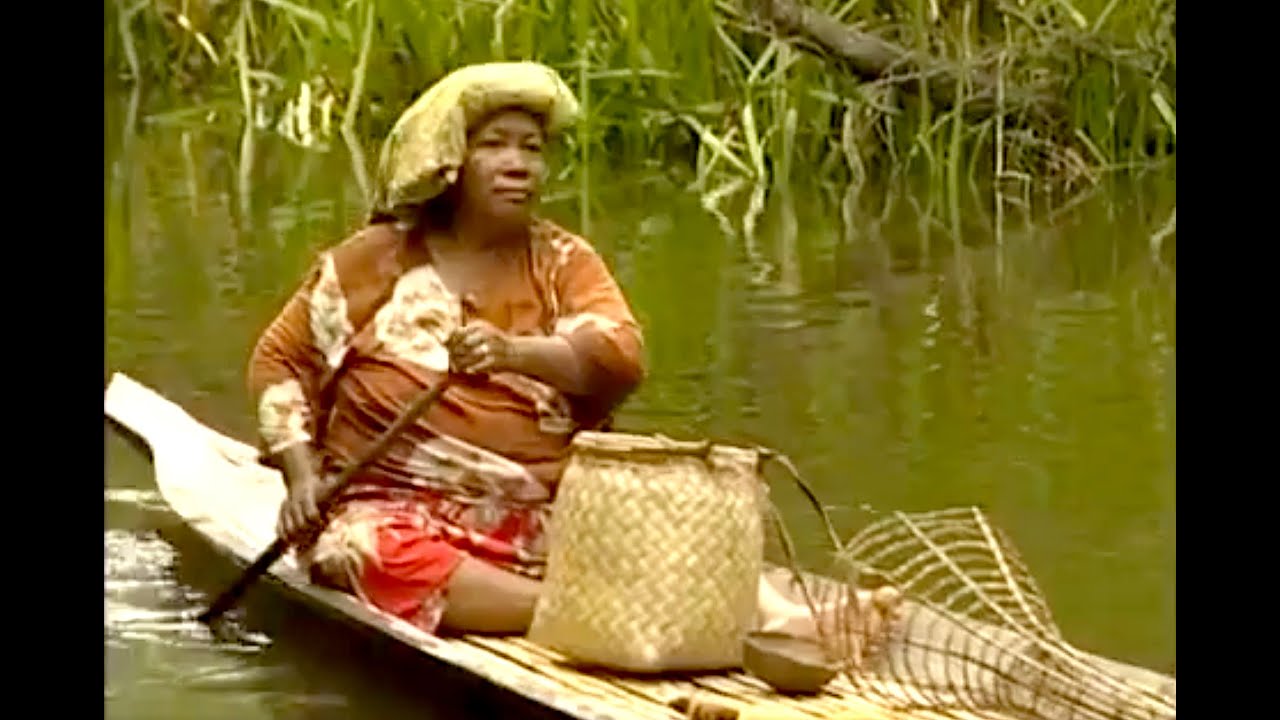 Tribal Semelai river fishing at Tasik Bera, Malaysia.