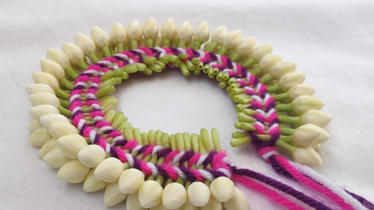 Multi color thread  using string nanthiyavattan  flower in one side. || Easy flower string method.