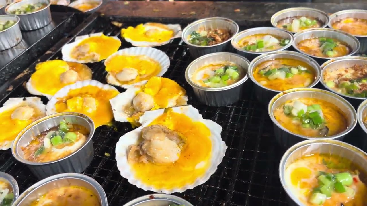 Sò nướng với trứng ngon cách lạ lung.
