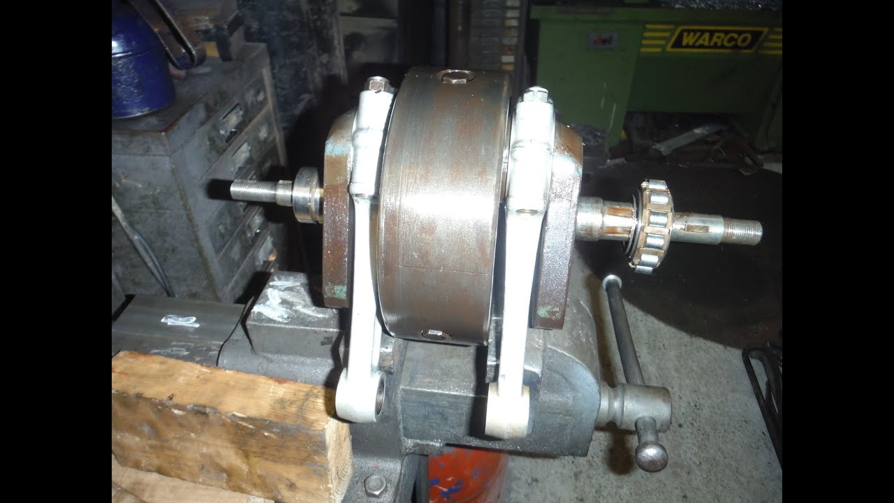 BSA A65 engine crank and bottom end components inspected and discussed.