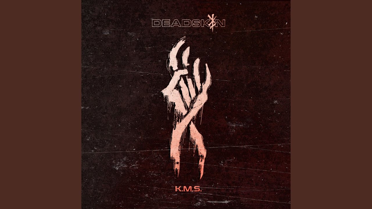K.M.S.