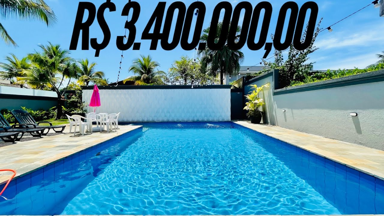 CASA DE ALTO PADRÃO DECORADA NO CONDOMÍNIO JARDIM ACAPULCO EM GUARUJÁ POR R$ 3.400.000,00