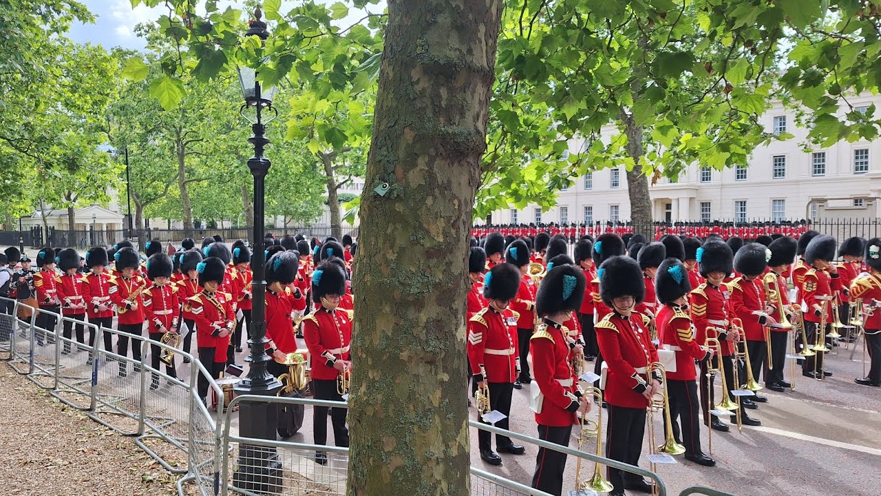 Massed bands 3 of 5 marching to Horse Guards Parade for  Colonel Review Trooping the Colour 2024