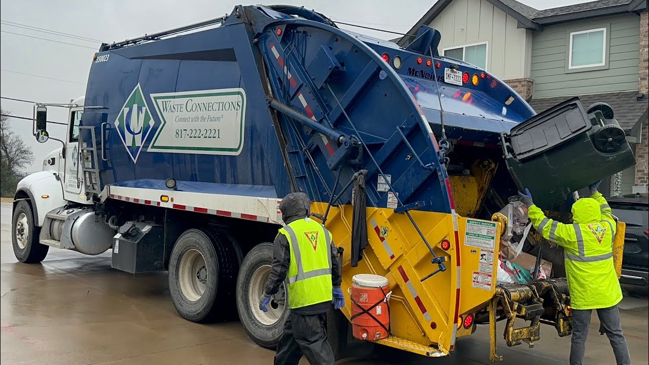 Waste Connections Peterbilt 348 McNeilus Rear Loader Garbage Truck Packing Wet Manual Trash