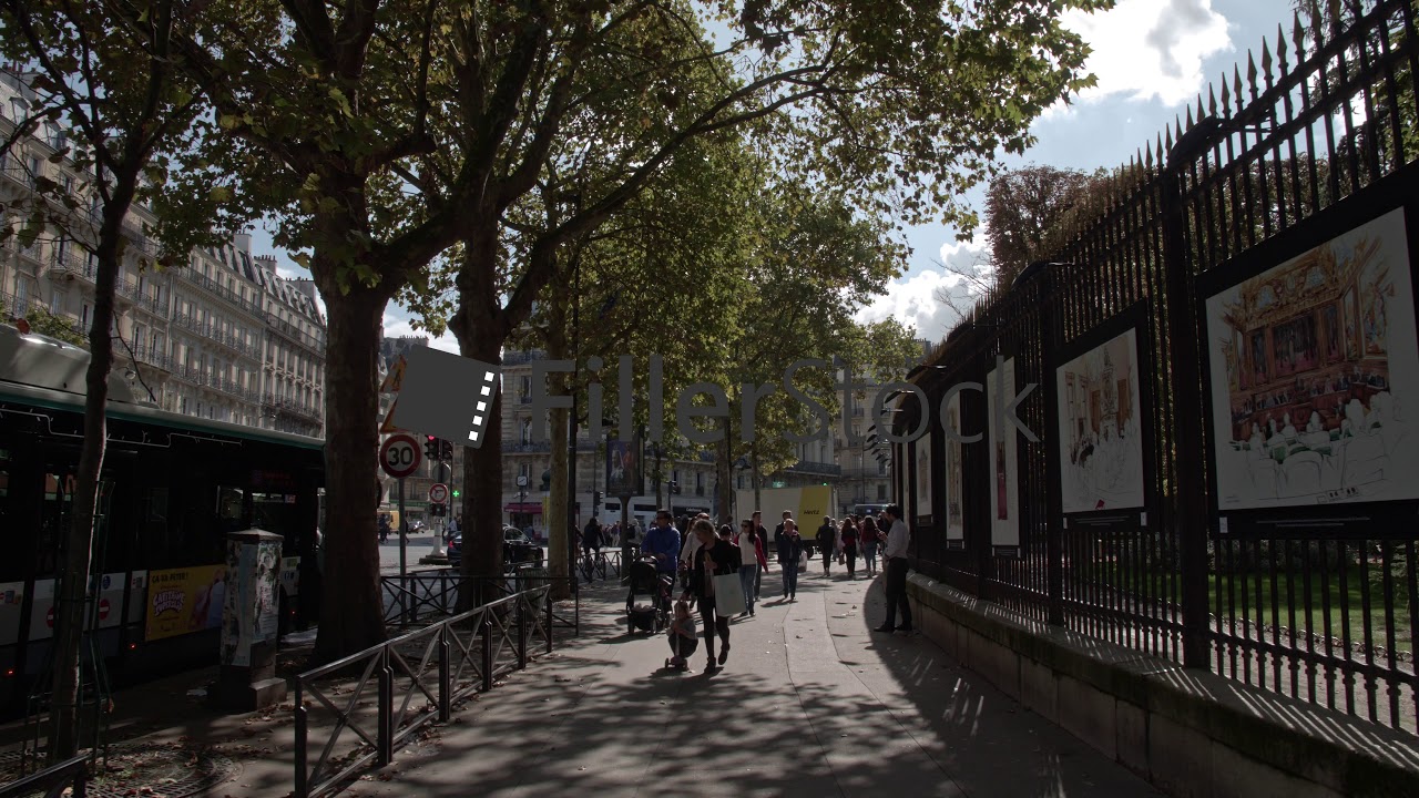 Timelapse of walking in busy crowded street in Paris, France