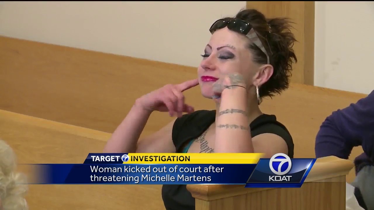 Woman kicked out of court after threatening Michelle Martens